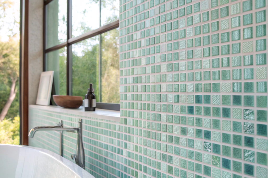 Bathroom floor showing a decorative mosaic tile border